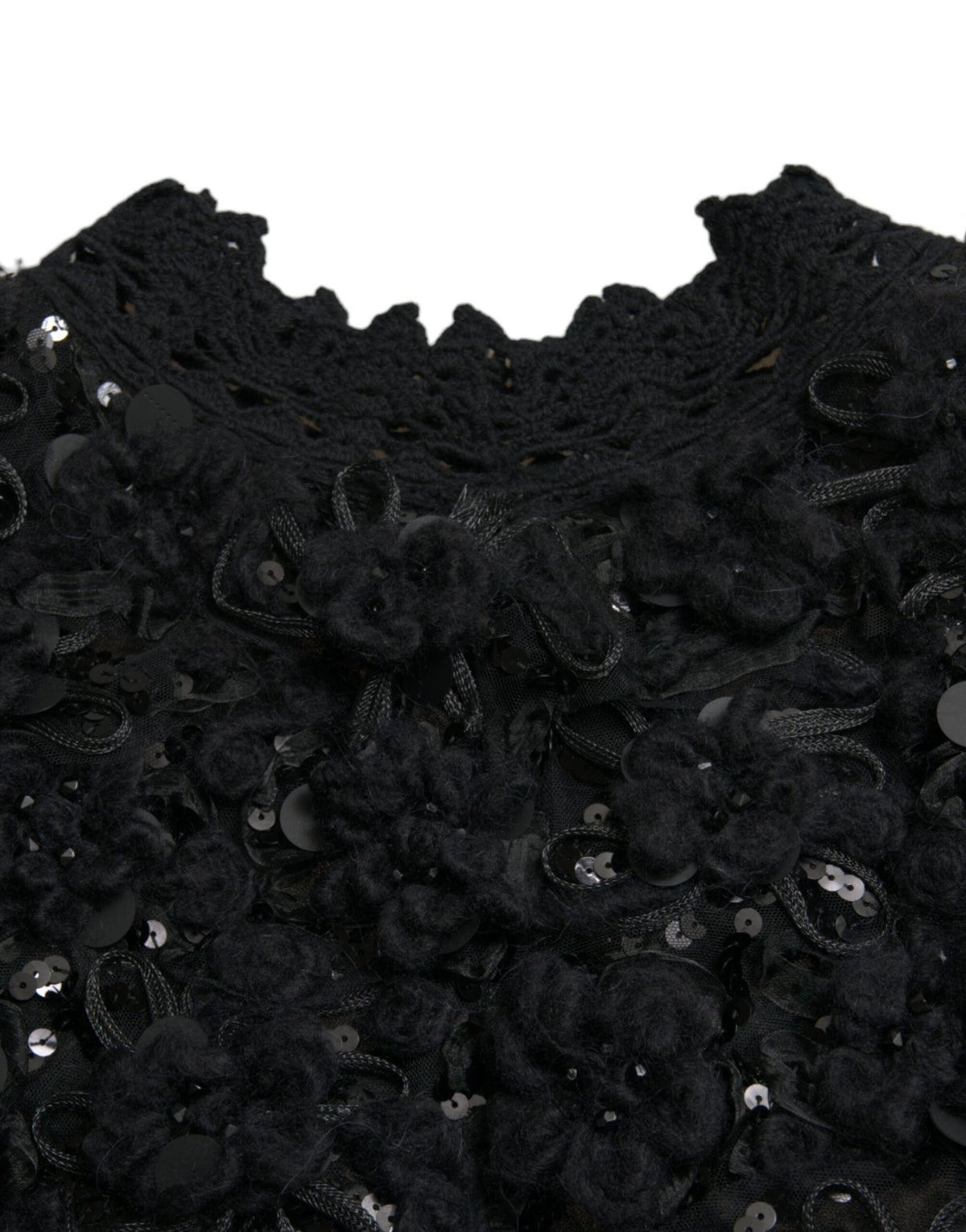 Indulge in the allure of the Dolce & Gabbana Black Sequined Embellished Pullover Sweater, a masterpiece of Italian craftsmanship that elevates your style with luxurious elegance.