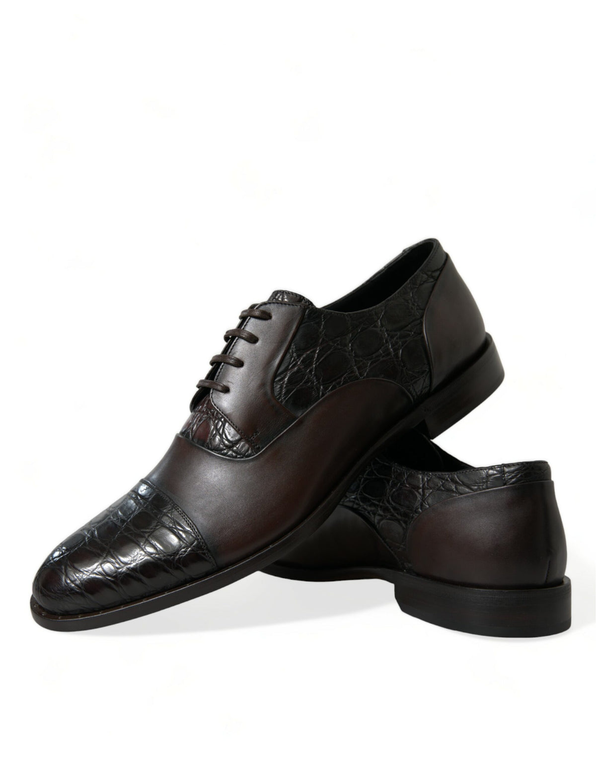 Indulge in the artisanal elegance of Dolce & Gabbana's Brown Exotic Leather Formal Men Dress Shoes, where exquisite Caiman and Calfskin craftsmanship meets timeless sophistication.