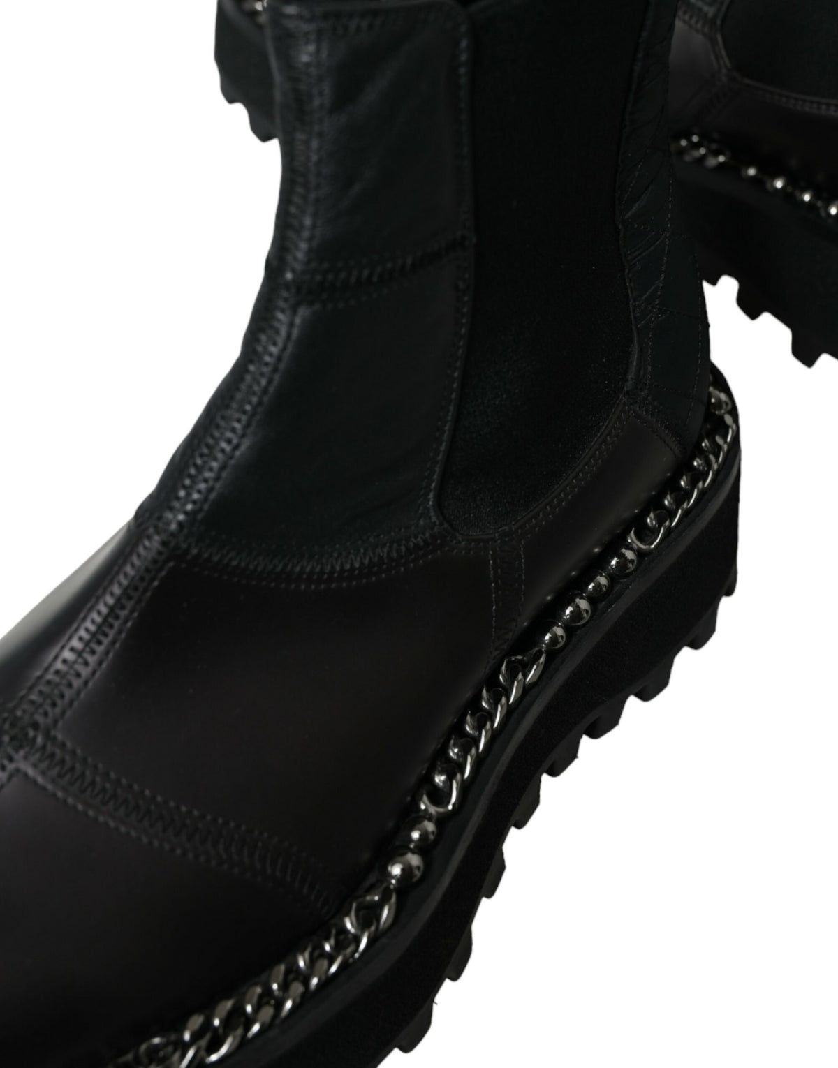 Step into elegance with Dolce & Gabbana's Black Leather Slip On Stretch Chelsea Boots, crafted in Italy from luxurious materials for unparalleled sophistication and comfort.