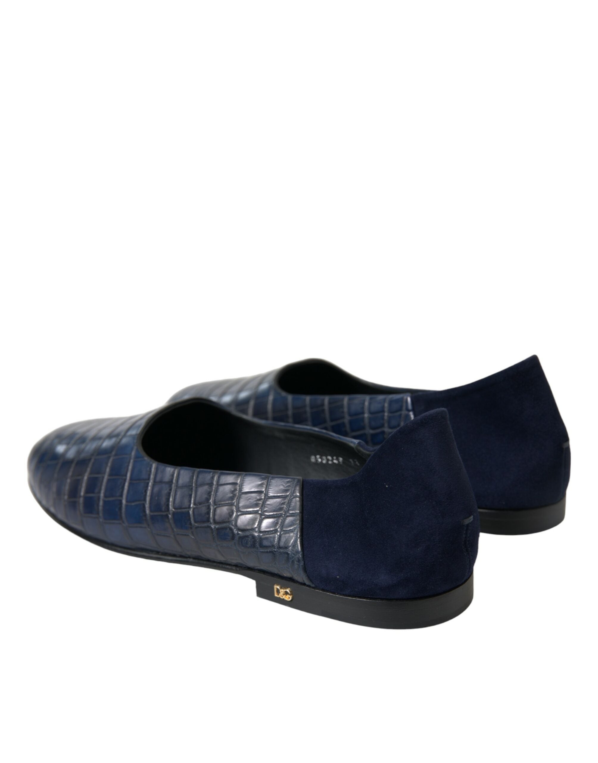 Indulge in the exquisite Dolce & Gabbana Blue Crocodile Leather Loafers, a timeless blend of luxury and sophistication, crafted for the discerning individual.