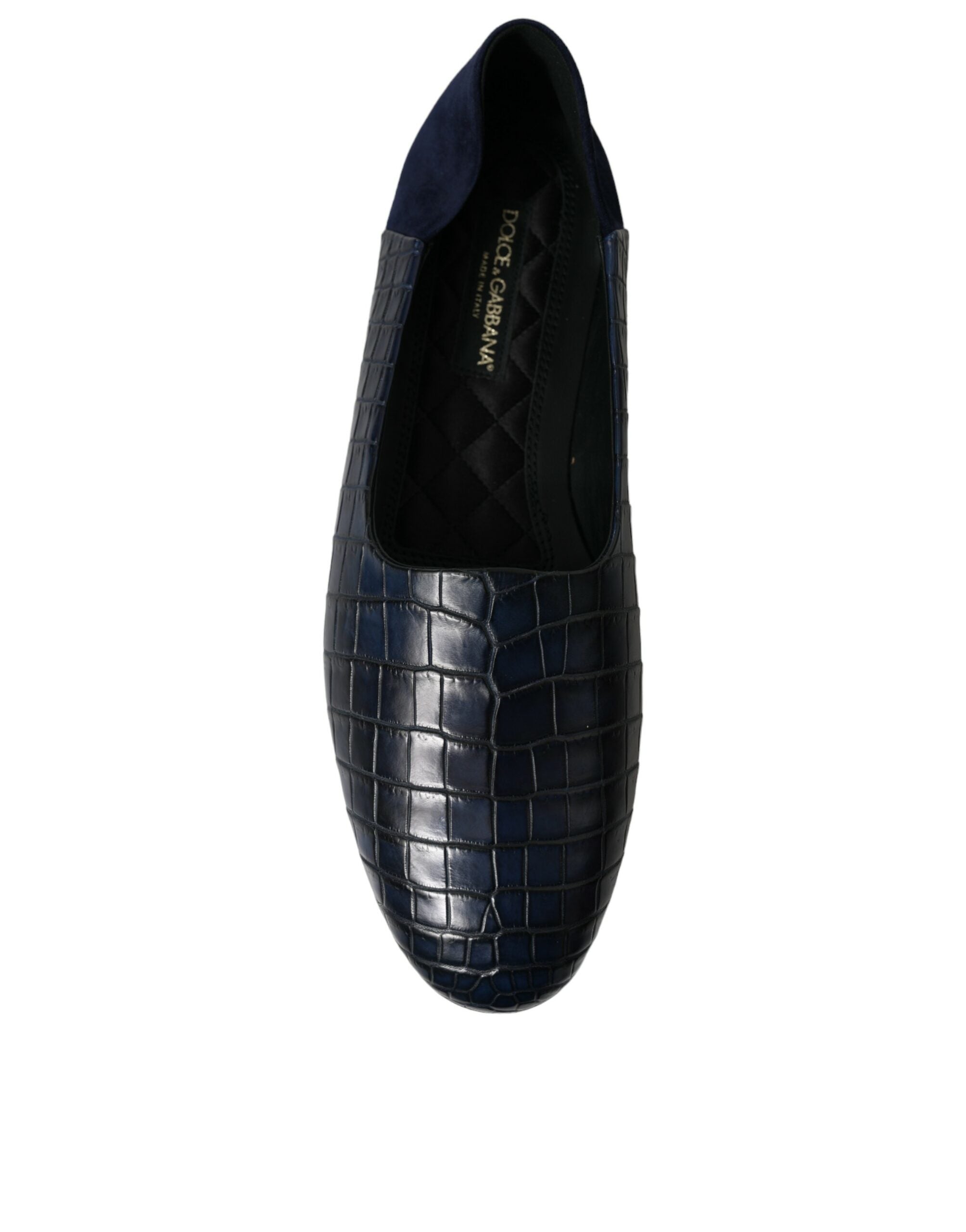 Indulge in the exquisite Dolce & Gabbana Blue Crocodile Leather Loafers, a timeless blend of luxury and sophistication crafted from the finest materials in Italy.
