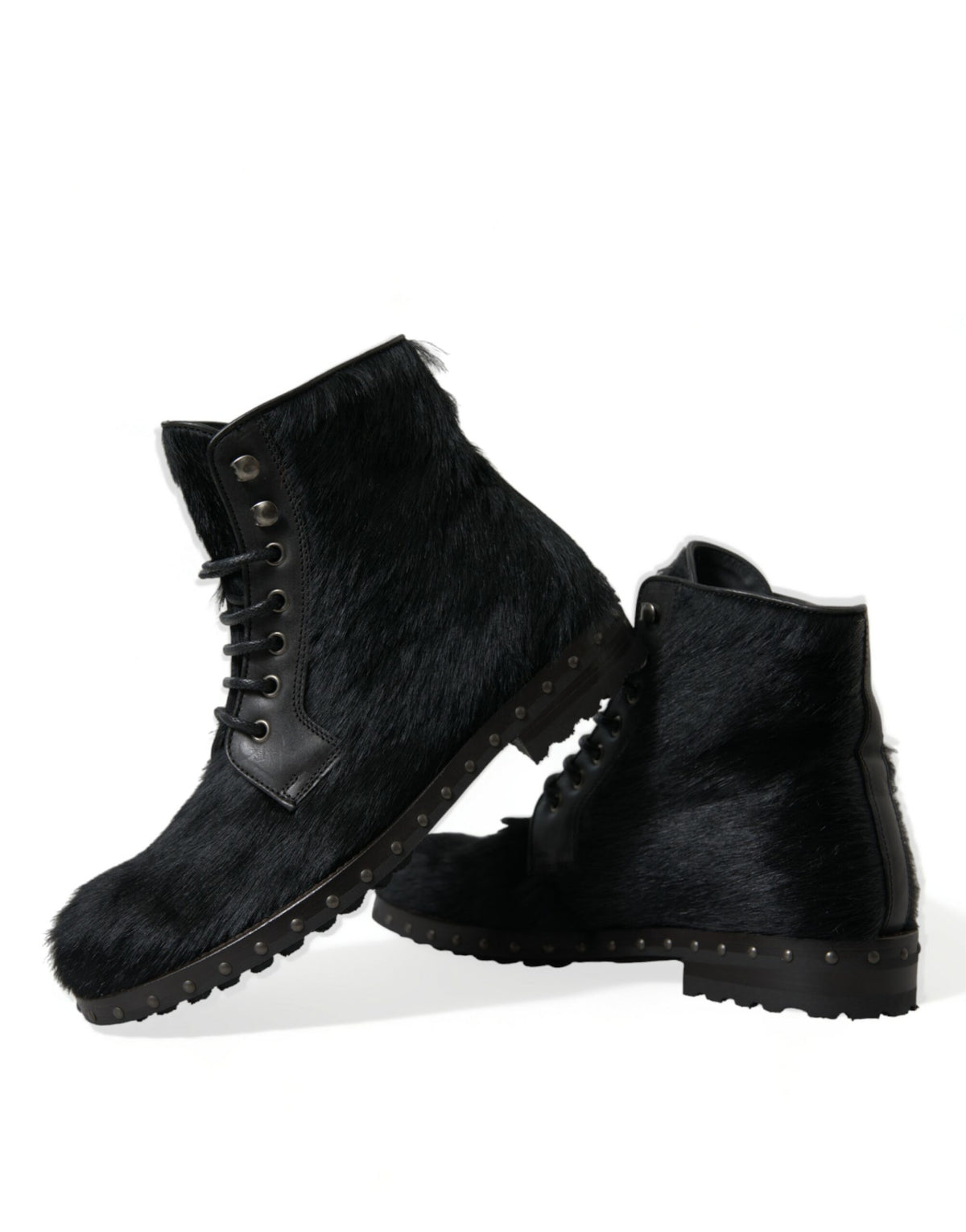 Elevate your style with Dolce & Gabbana's Black Pony Style Leather Mid Calf Boots, crafted from luxurious calf leather for the discerning individual who embodies sophistication and power.