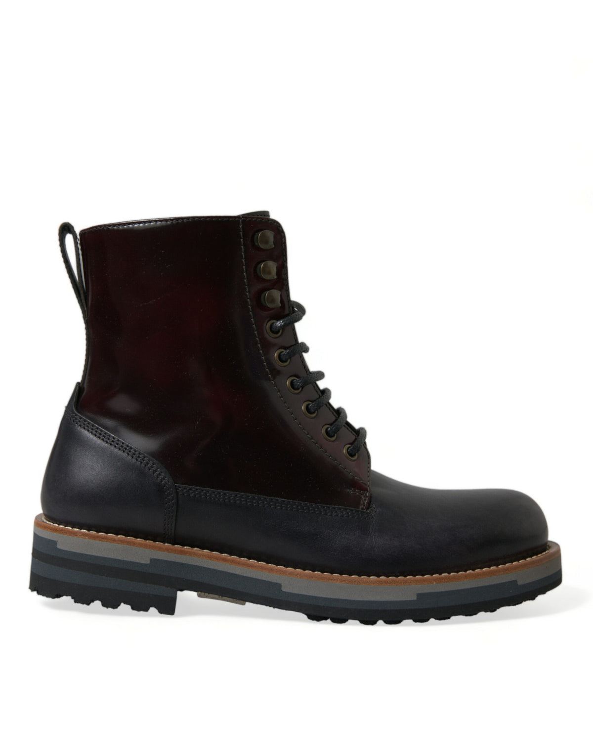 Step into unparalleled luxury with Dolce & Gabbana's Black Leather Military Combat Boots, crafted from premium calf leather for timeless elegance and sophisticated allure.