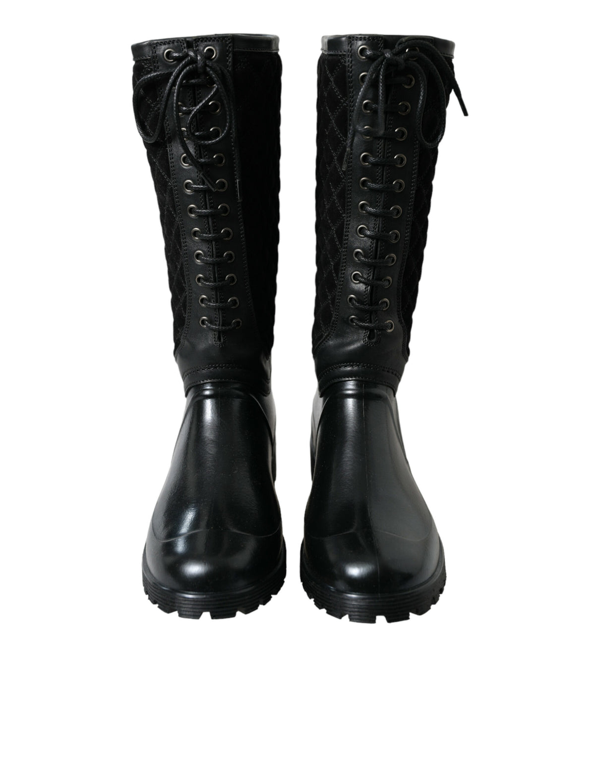 Indulge in the exquisite Dolce & Gabbana Black Chioggia Rain Boots, where luxurious calfskin and PVC meet sophisticated design for a statement of refined elegance.
