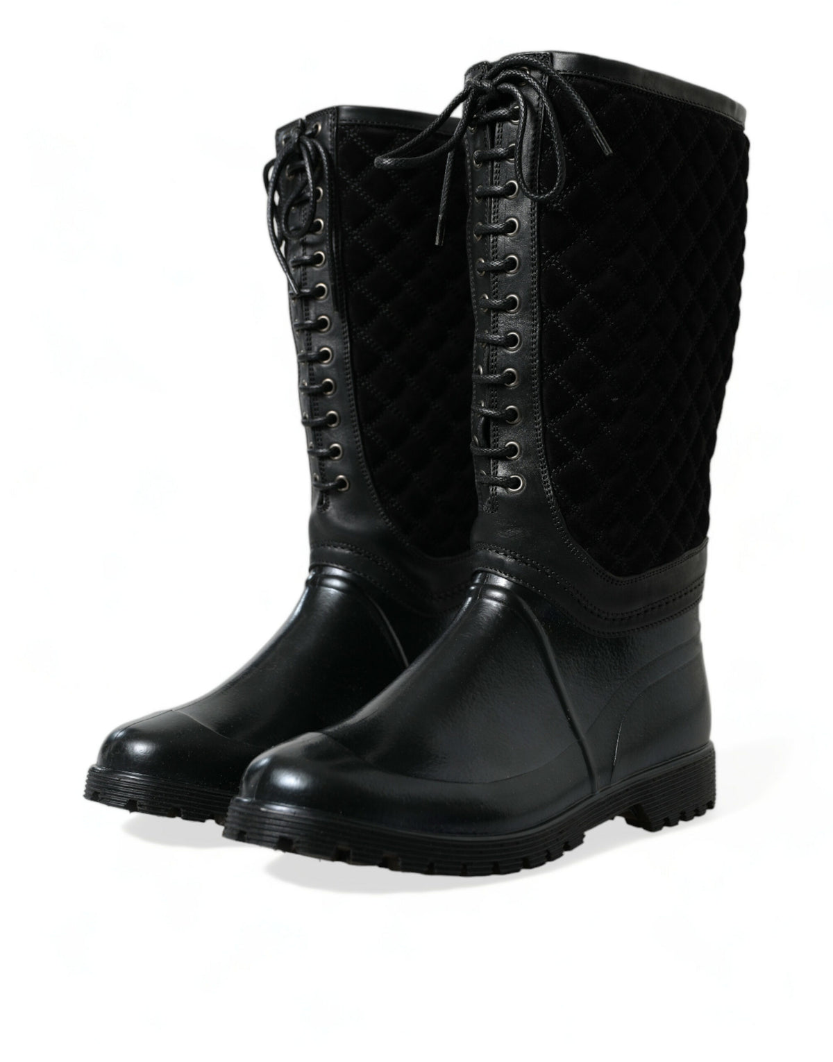 Elevate your style with the Dolce & Gabbana Black Chioggia Rain Boots, a fusion of exquisite calfskin and PVC, embodying luxury and sophistication for every occasion.