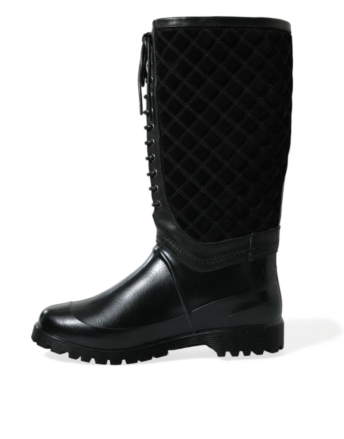 Indulge in the exquisite Dolce & Gabbana Black Chioggia Rain Boots, where luxurious calfskin and PVC meet impeccable craftsmanship for a refined statement in any weather.