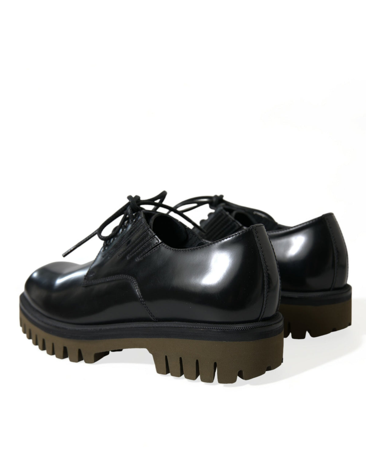 Step into the realm of sophistication with Dolce & Gabbana's Black Leather Lace Up Derby Shoes, where exquisite Italian craftsmanship meets timeless elegance for the discerning individual.