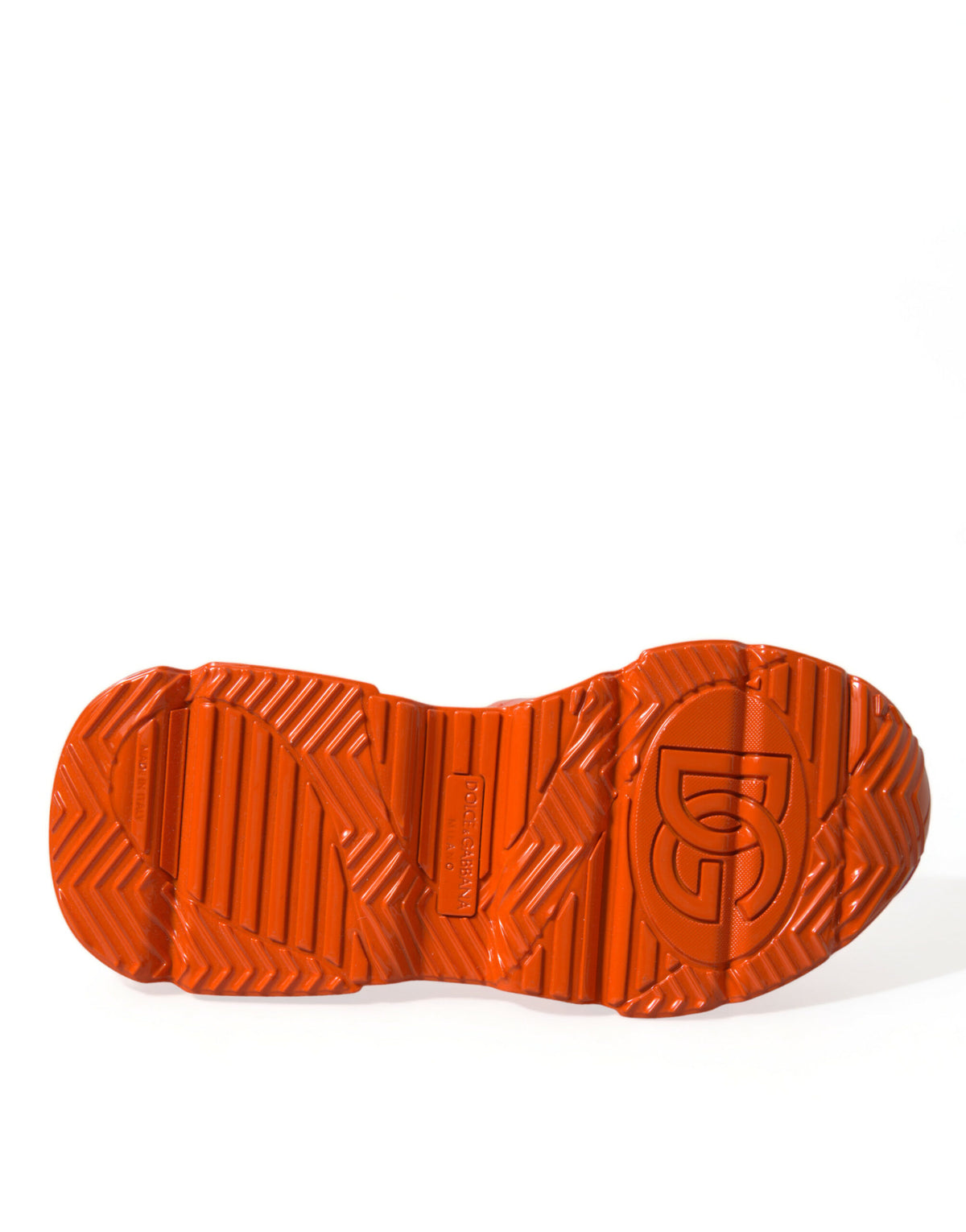 Indulge in the allure of Dolce & Gabbana's Orange Multi Panel Chunky High Top Sneakers, where exquisite craftsmanship meets bold luxury for a statement in haute couture fashion.