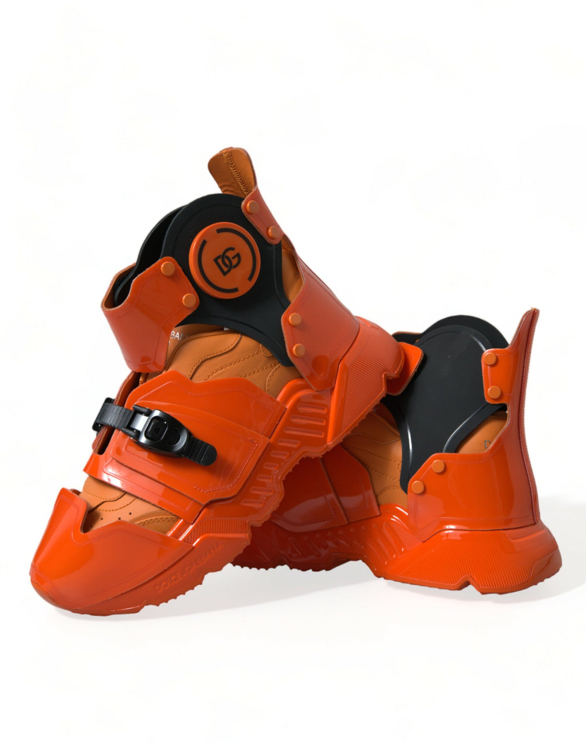 Step into luxury with Dolce & Gabbana's Orange Multi Panel Chunky High Top Sneakers, where exquisite craftsmanship meets bold design for an unparalleled fashion statement.