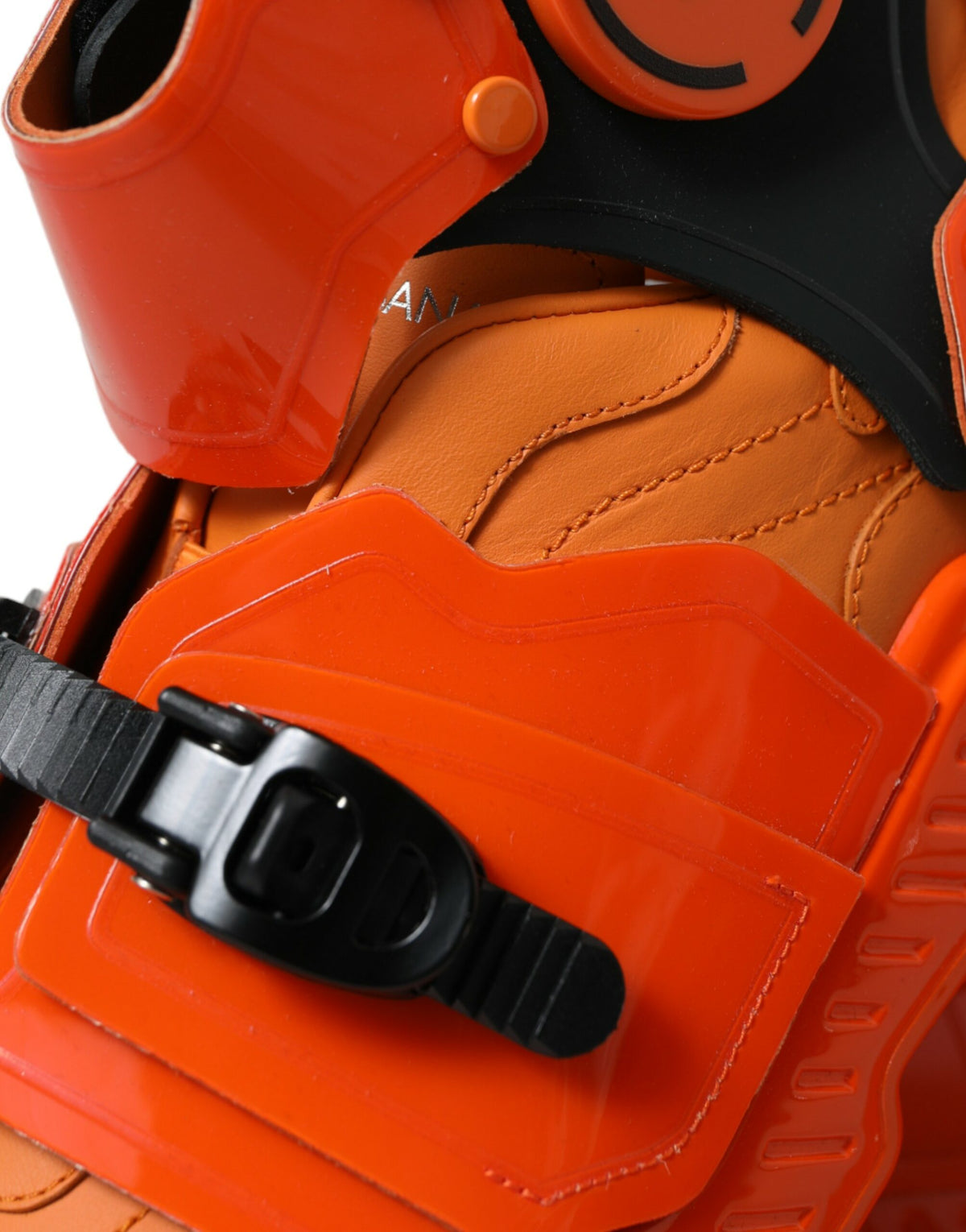 Step into luxury with Dolce & Gabbana's Orange Multi Panel Chunky High Top Sneakers, where exquisite craftsmanship meets bold design for a statement of refined elegance.