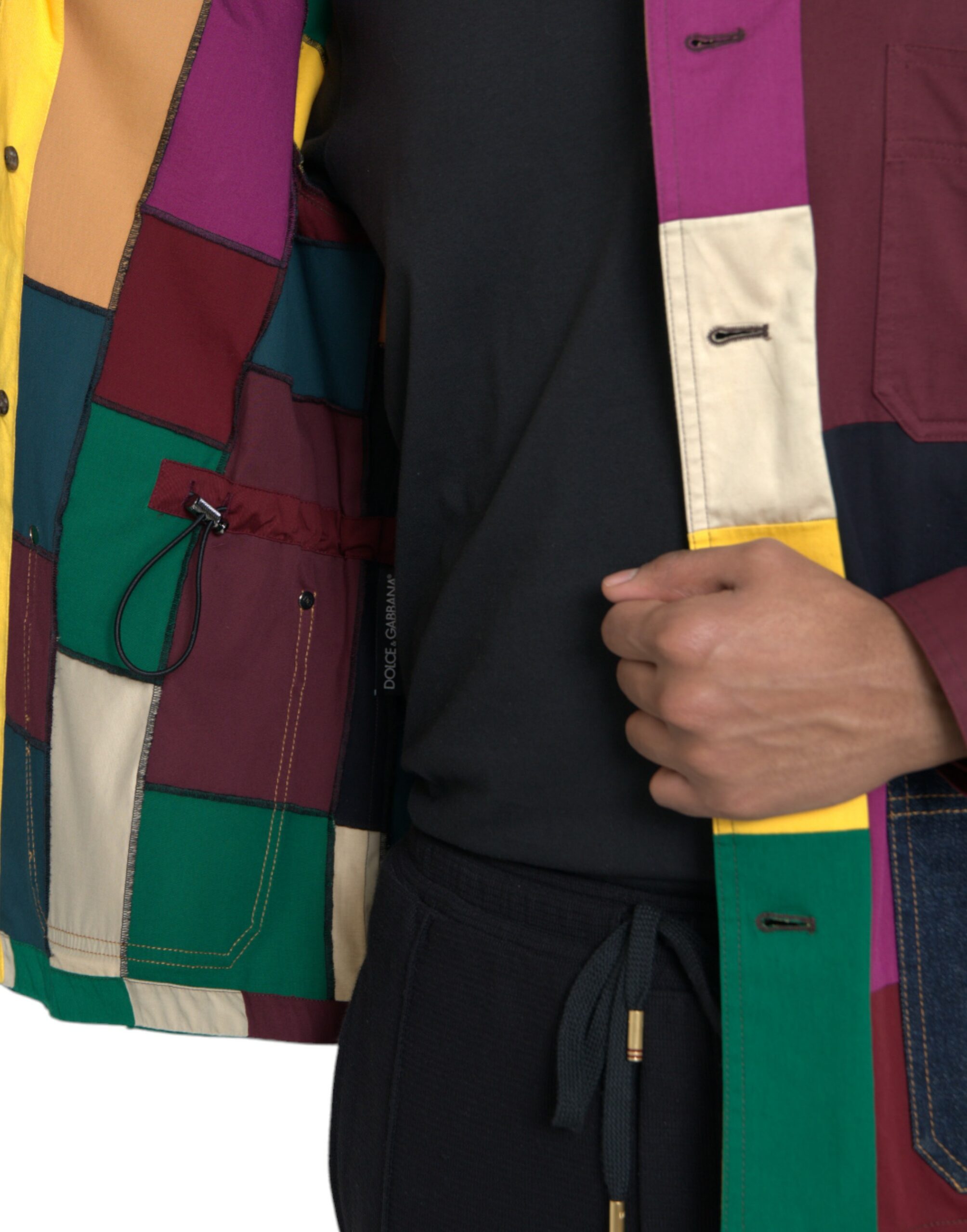 Elevate your wardrobe with the Dolce & Gabbana Multicolor Patchwork Cotton Collared Jacket, a masterpiece of Italian craftsmanship that embodies luxury and sophistication.
