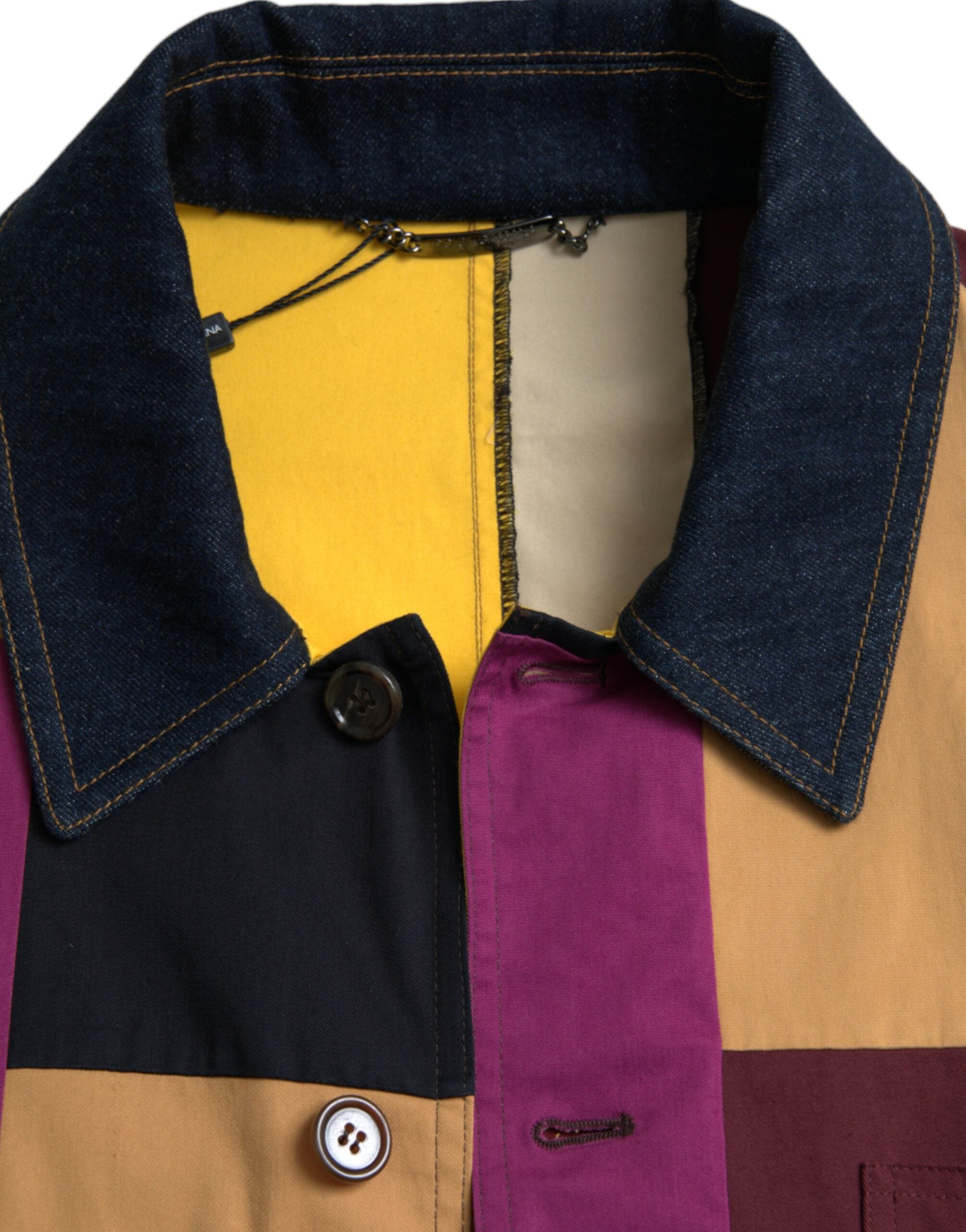 Discover the Dolce & Gabbana Multicolor Patchwork Cotton Collared Jacket, a masterpiece of Italian craftsmanship that elevates your style with luxurious elegance and vibrant artistry.