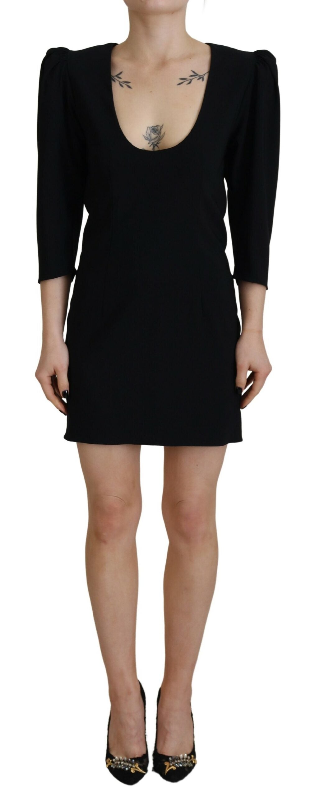 Indulge in the exquisite Dsquared² Black Bodycon Sheath Dress, where luxurious polyester and elastane embrace your silhouette, embodying timeless elegance for every occasion.