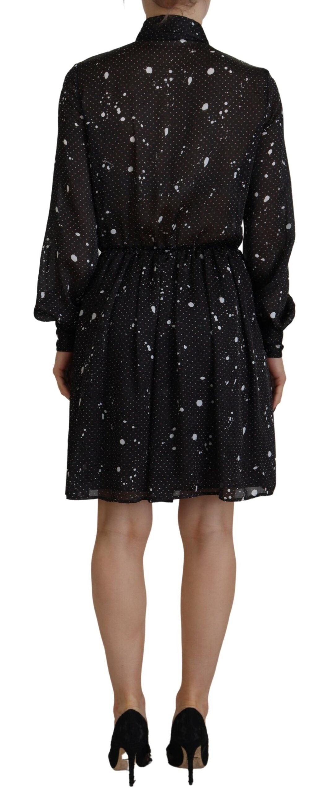 Elevate your wardrobe with the Dsquared² Black Polka Dot Long Sleeves Button Down Dress, a timeless piece crafted from luxurious polyester, embodying exquisite couture elegance for the discerning individual.
