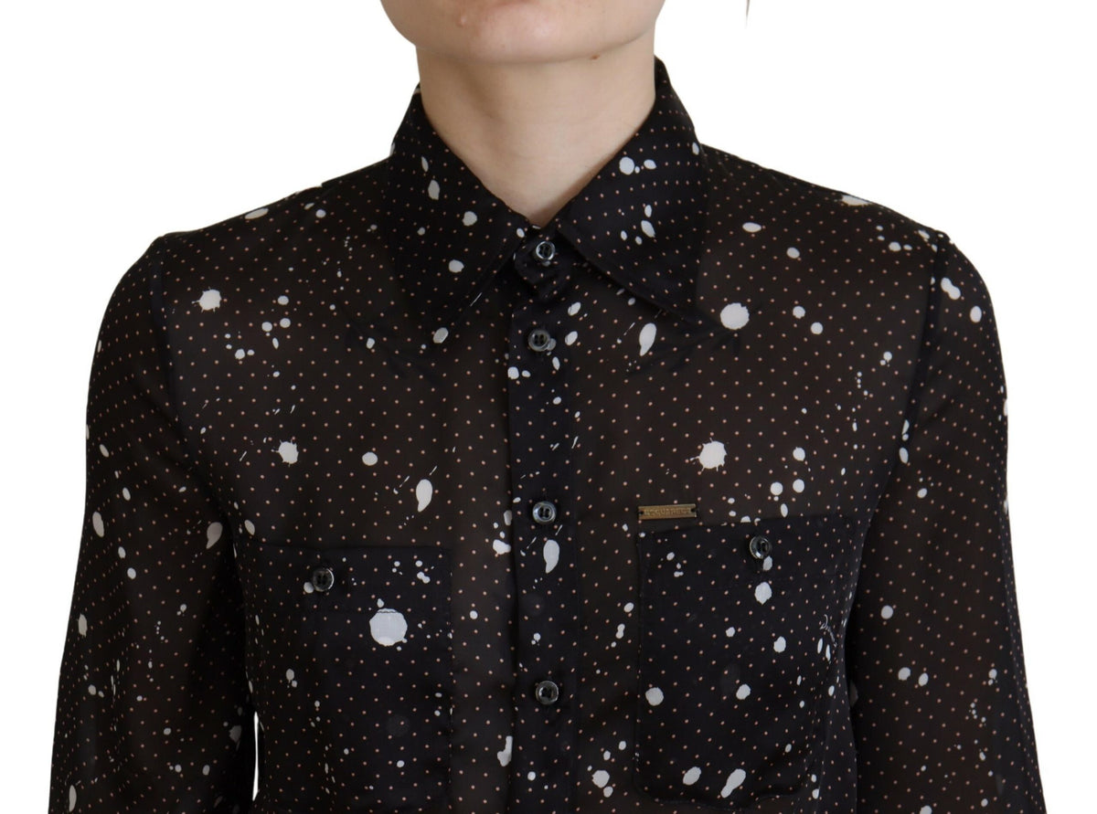 Experience the exquisite allure of the Dsquared² Black Polka Dot Long Sleeves Button Down Dress, crafted from luxurious polyester, embodying timeless elegance and sophistication for the discerning individual.