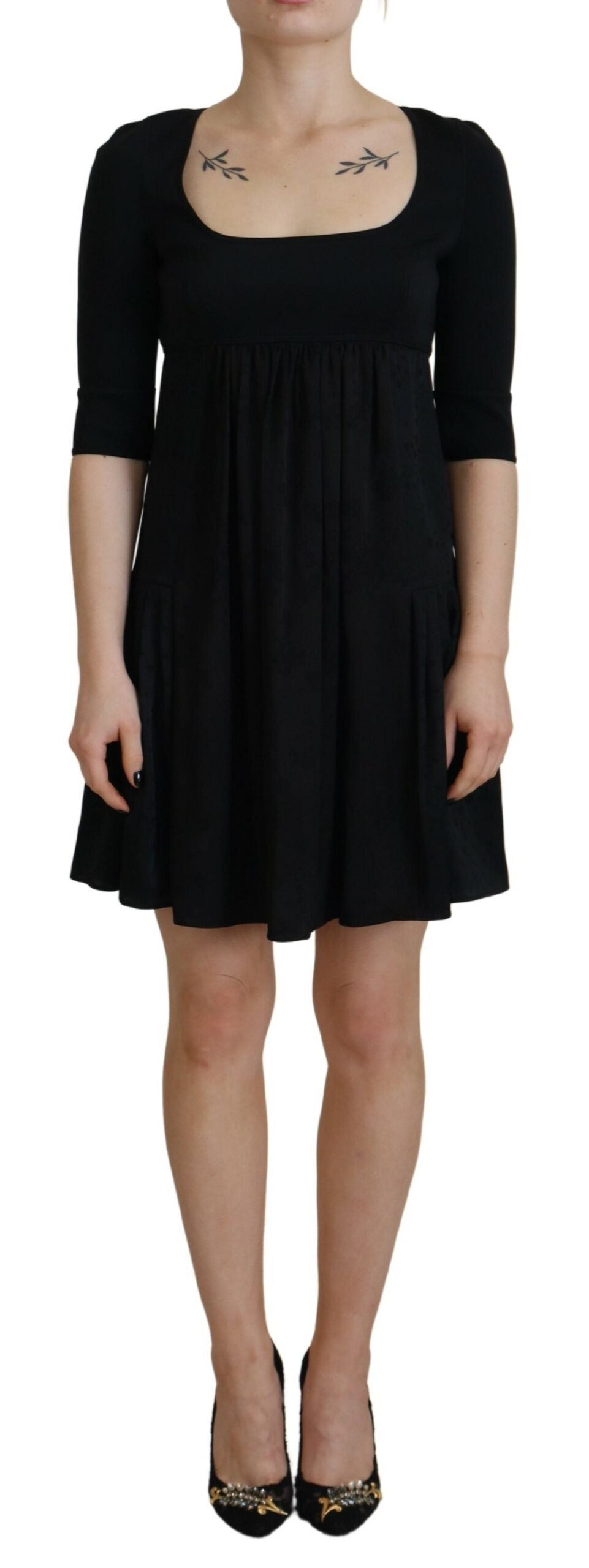 Indulge in the exquisite allure of the Dsquared² Black Acetate Short Sleeves A-line Sheath Dress, a timeless masterpiece that embodies luxury and sophistication for any occasion.