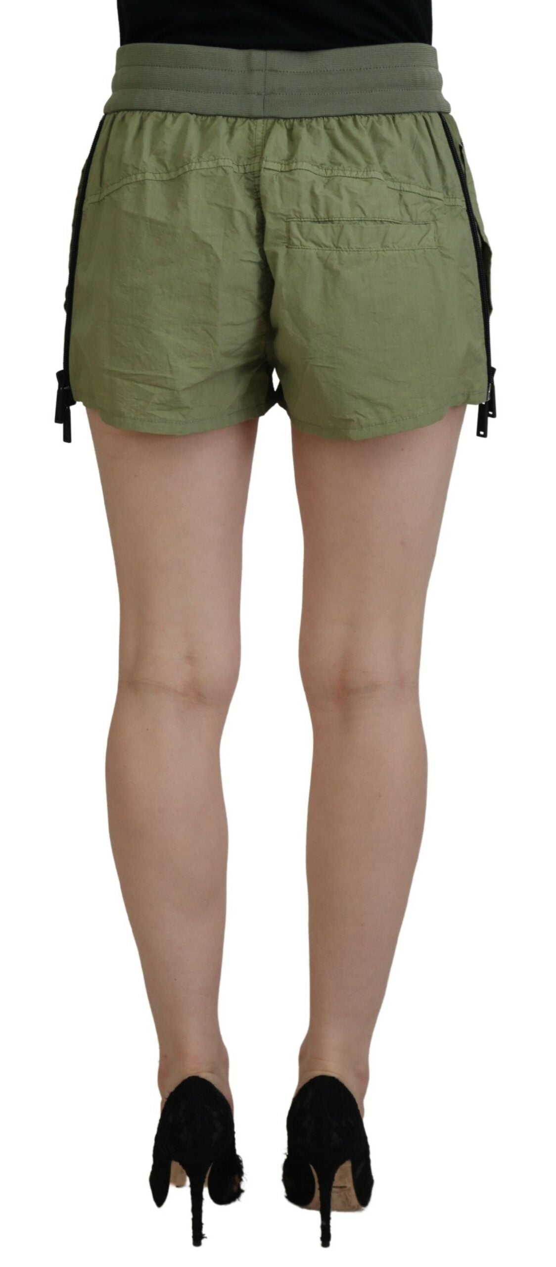 Indulge in the exquisite allure of Dsquared² Green Cotton Mid Waist Drawstring Tapered Shorts, where Italian craftsmanship meets timeless elegance for the discerning individual.