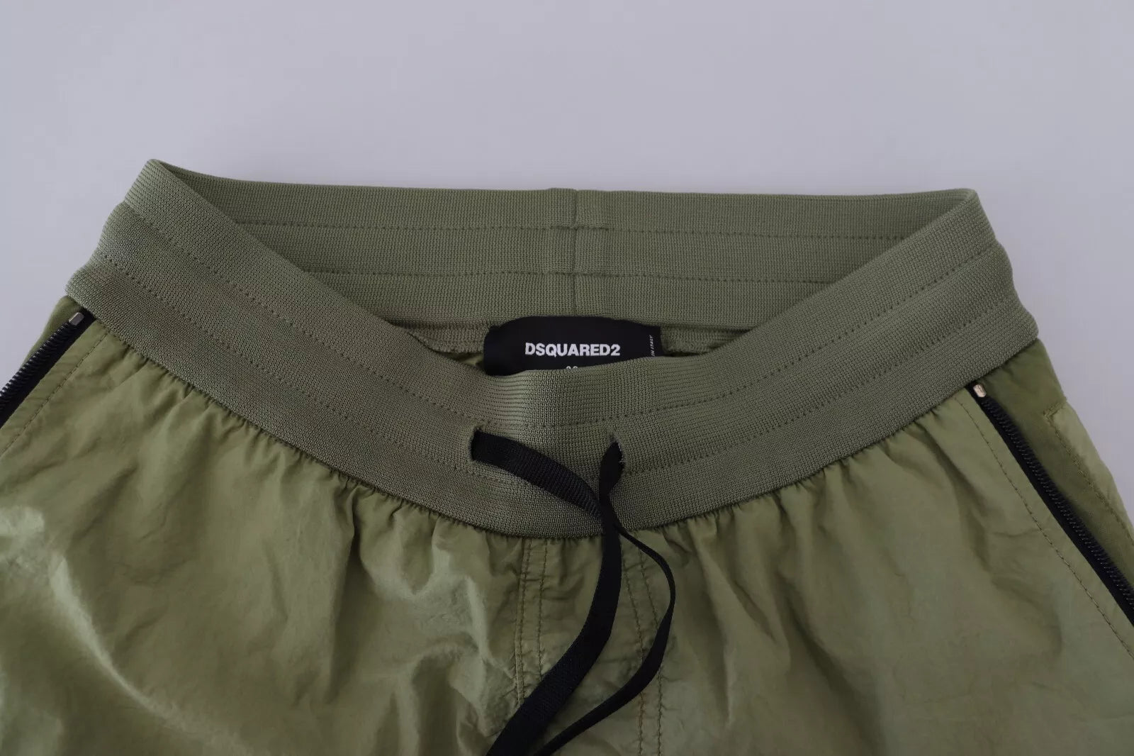 Indulge in the exquisite allure of Dsquared² Green Cotton Mid Waist Drawstring Tapered Shorts, where Italian craftsmanship meets timeless elegance for the discerning individual.
