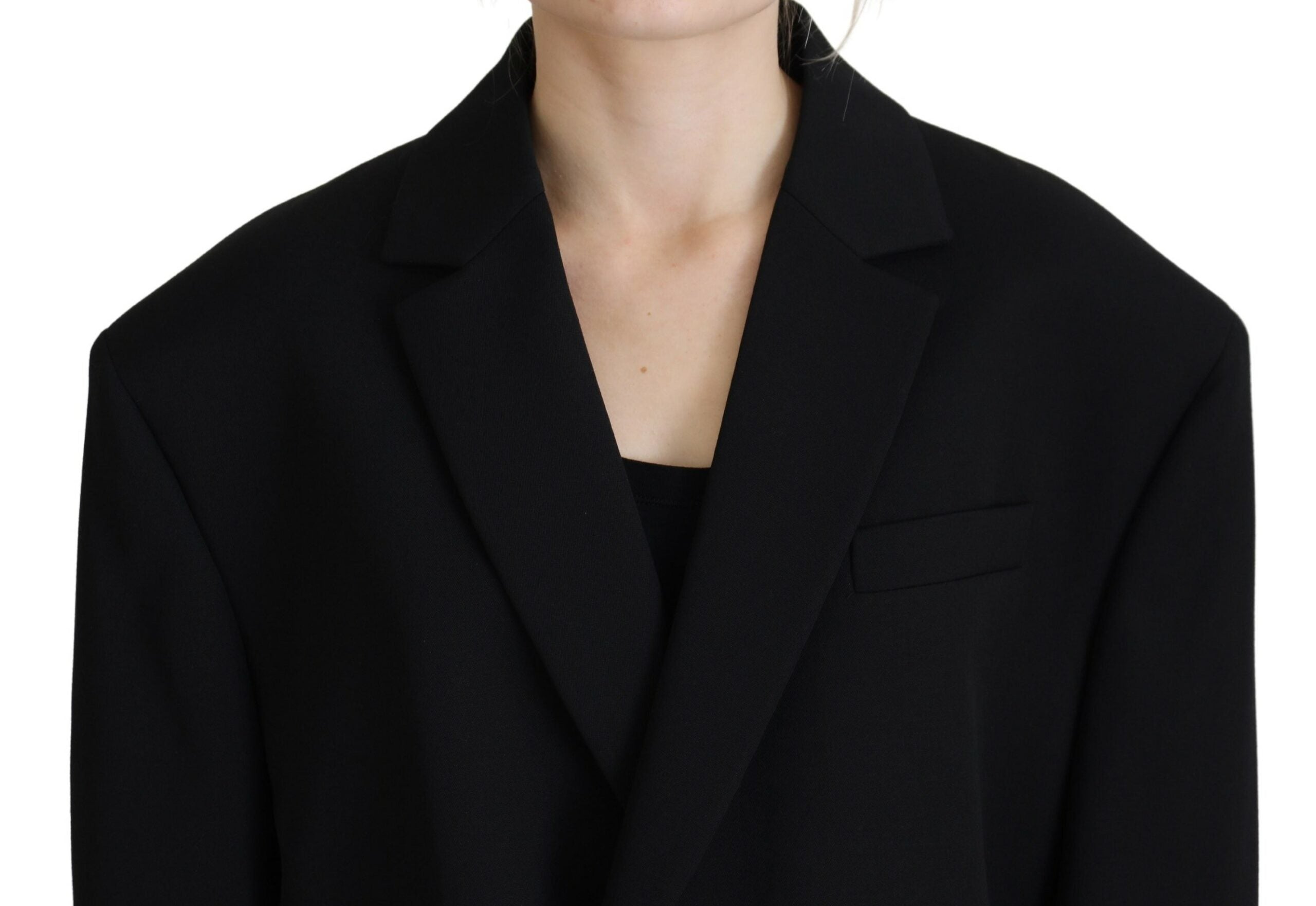 Elevate your wardrobe with the Dsquared² Black Double Breasted Coat Blazer Jacket, a masterpiece of 100% virgin wool that embodies luxury and Italian craftsmanship for the discerning individual.