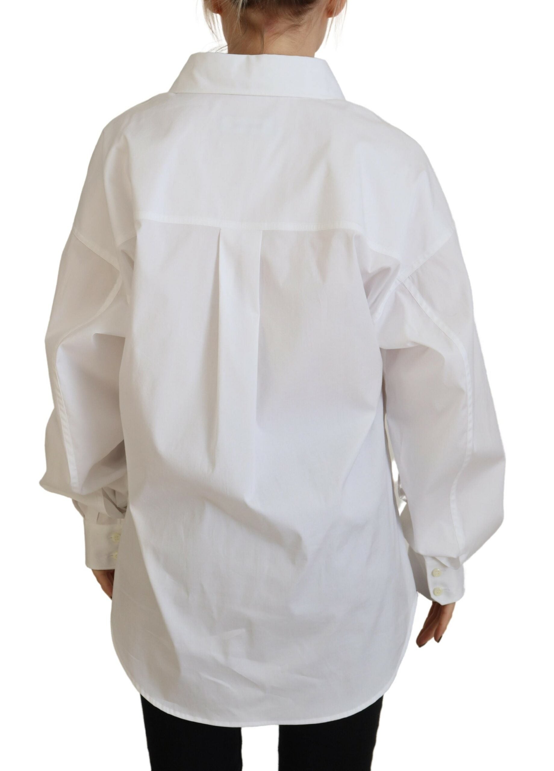 Elevate your wardrobe with the Dsquared² White Cotton Button Down Dress Shirt, a luxurious blend of exquisite craftsmanship and timeless elegance, perfect for any occasion.