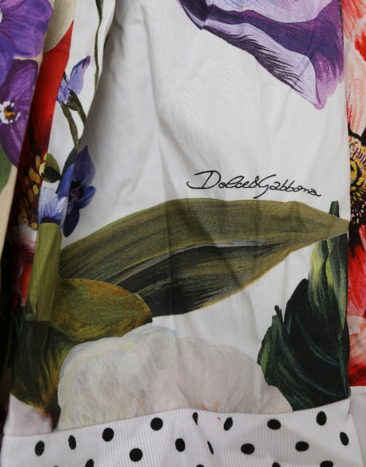 Discover the Dolce & Gabbana Multicolor Patchwork Cotton Aline Mini Dress, a masterpiece of Italian craftsmanship that embodies luxury and individuality for every occasion.
