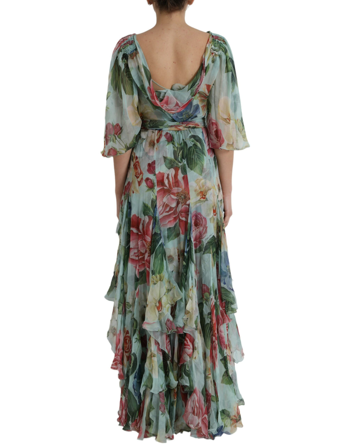 Indulge in the exquisite allure of the Dolce & Gabbana Blue Floral Print Tiered Long Maxi Dress, where luxurious silk meets enchanting artistry for an unforgettable silhouette.