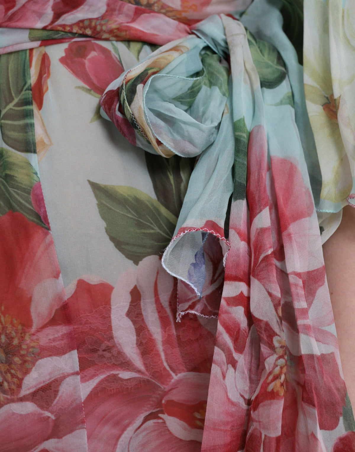 Indulge in the exquisite Dolce & Gabbana Blue Floral Print Tiered Long Maxi Dress, a silk masterpiece that embodies luxury and elegance for unforgettable moments.