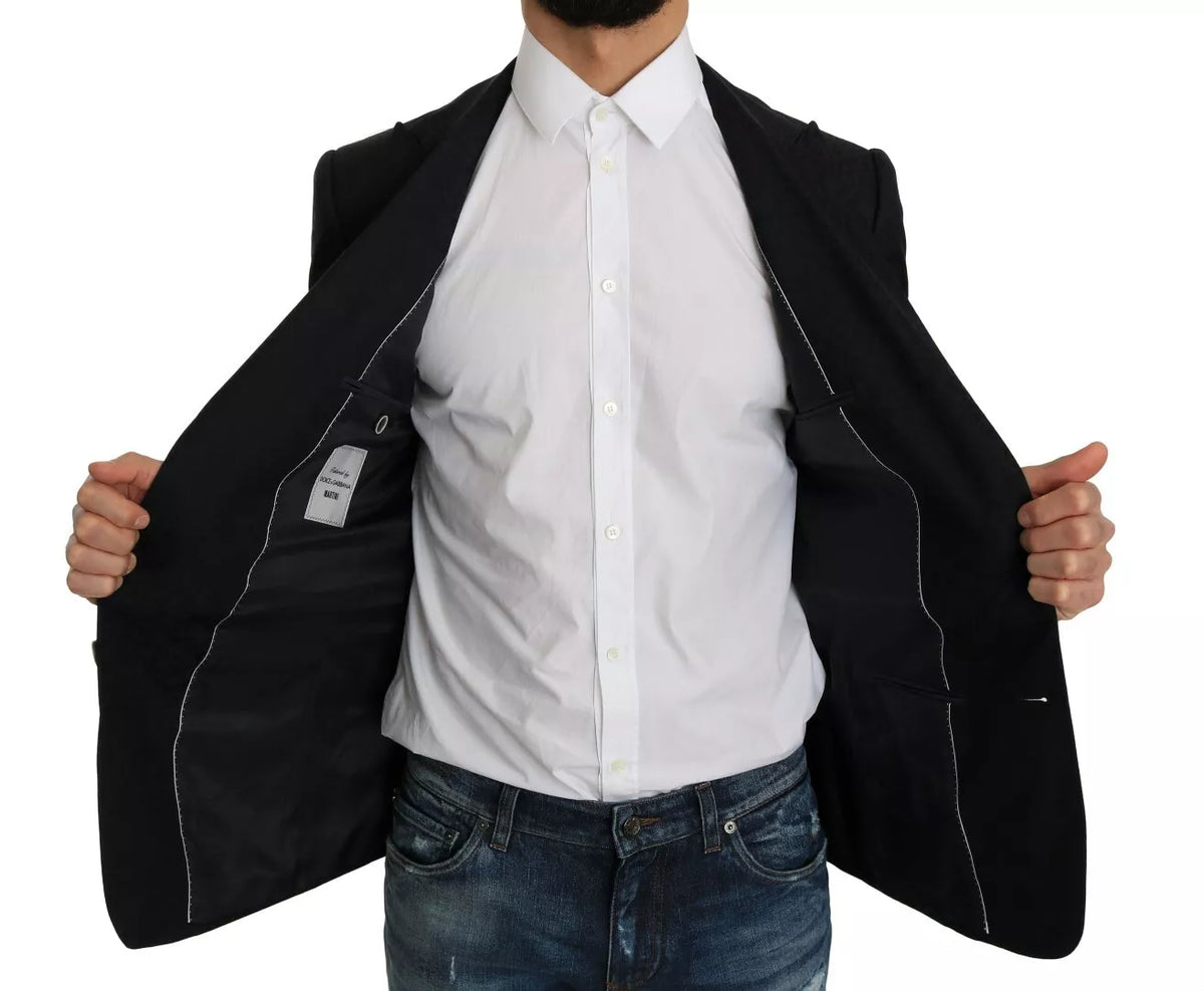Experience the exquisite allure of Dolce & Gabbana's Blue Jacquard Slim Floral Jacket Blazer, where luxurious wool and silk blend in timeless elegance, perfect for the discerning individual.