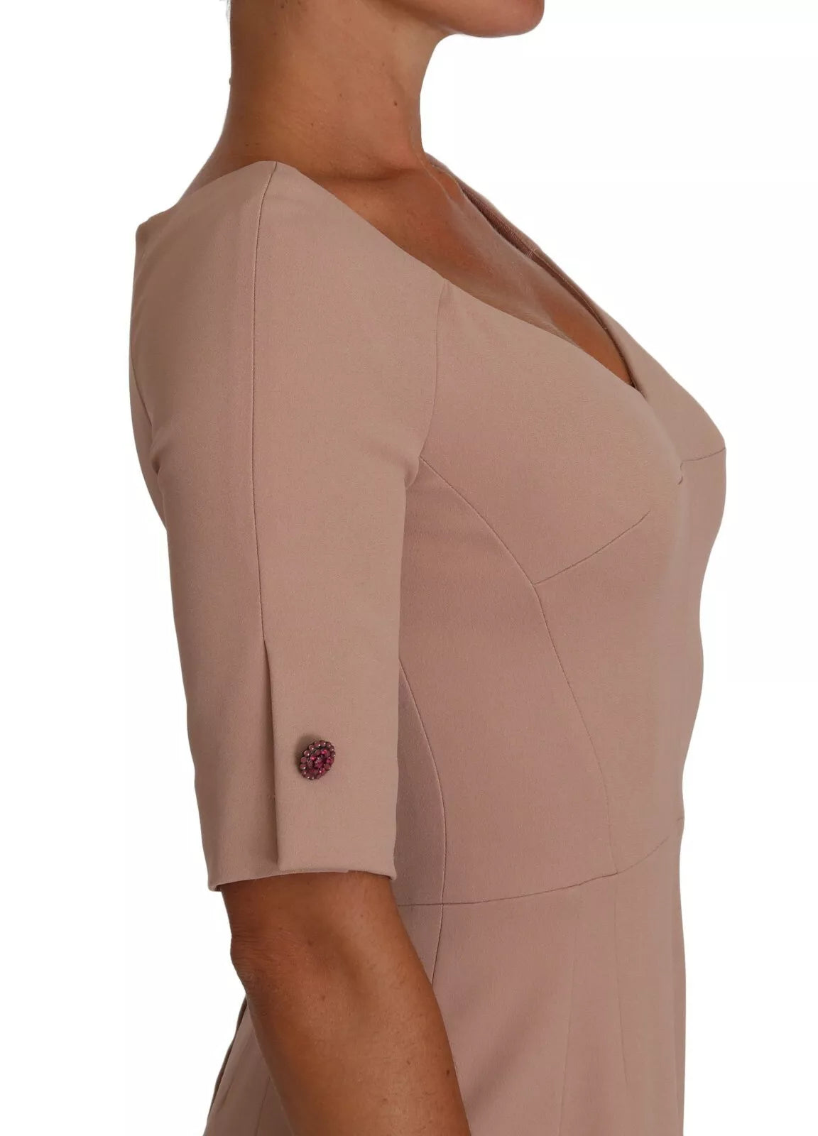 Indulge in the exquisite allure of the Dolce & Gabbana Dusty Pink Midi Sheath Dress, where luxurious materials and meticulous craftsmanship elevate your sophisticated style.