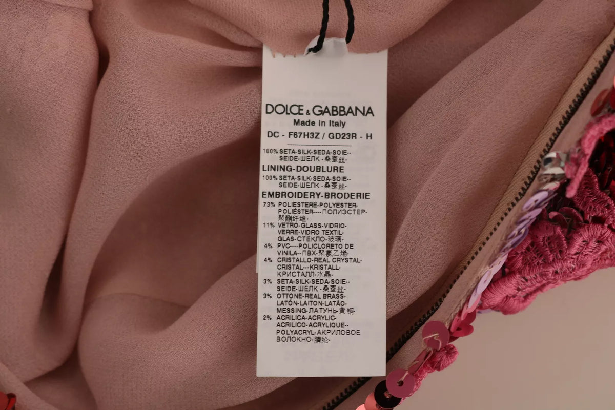 Indulge in the exquisite allure of the Dolce & Gabbana Pink Floral Sequined Crystal Gown, a limited edition masterpiece crafted from luxurious silk, embodying opulence and elegance for unforgettable moments.