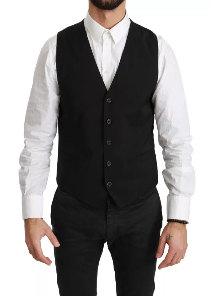 Elevate your wardrobe with the Dolce & Gabbana Black Wool Stretch Waistcoat, a masterpiece of Italian craftsmanship that embodies timeless elegance and sophisticated allure.