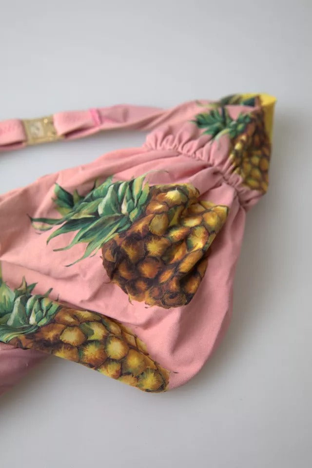Indulge in the exquisite Dolce & Gabbana Pink Printed Beachwear Bikini Top, a luxurious blend of nylon and elastane, embodying Italian craftsmanship and summer elegance.