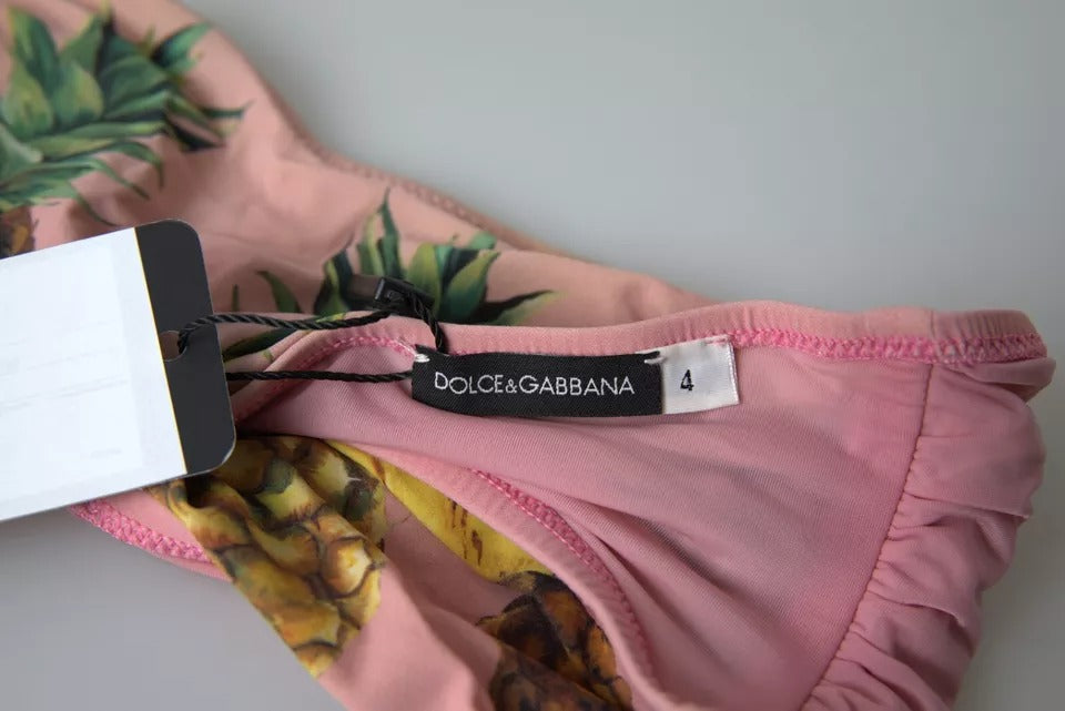 Elevate your summer allure with the Dolce & Gabbana Pink Printed Beachwear Bikini Top, crafted from luxurious nylon and elastane for an exquisite fit that embodies Italian elegance.
