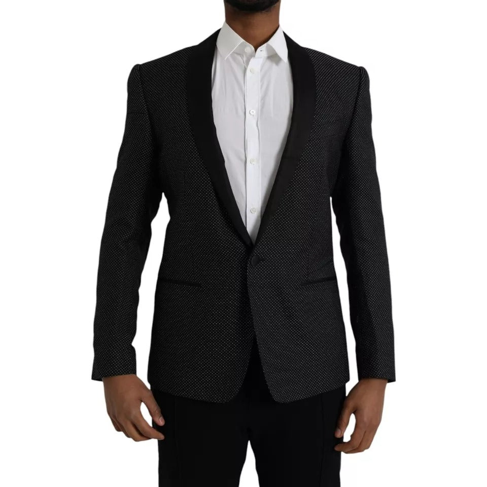 Elevate your wardrobe with the Dolce & Gabbana Black Jacquard MARTINI Blazer, a masterpiece of Italian craftsmanship, blending luxurious silk and timeless elegance for the discerning individual.