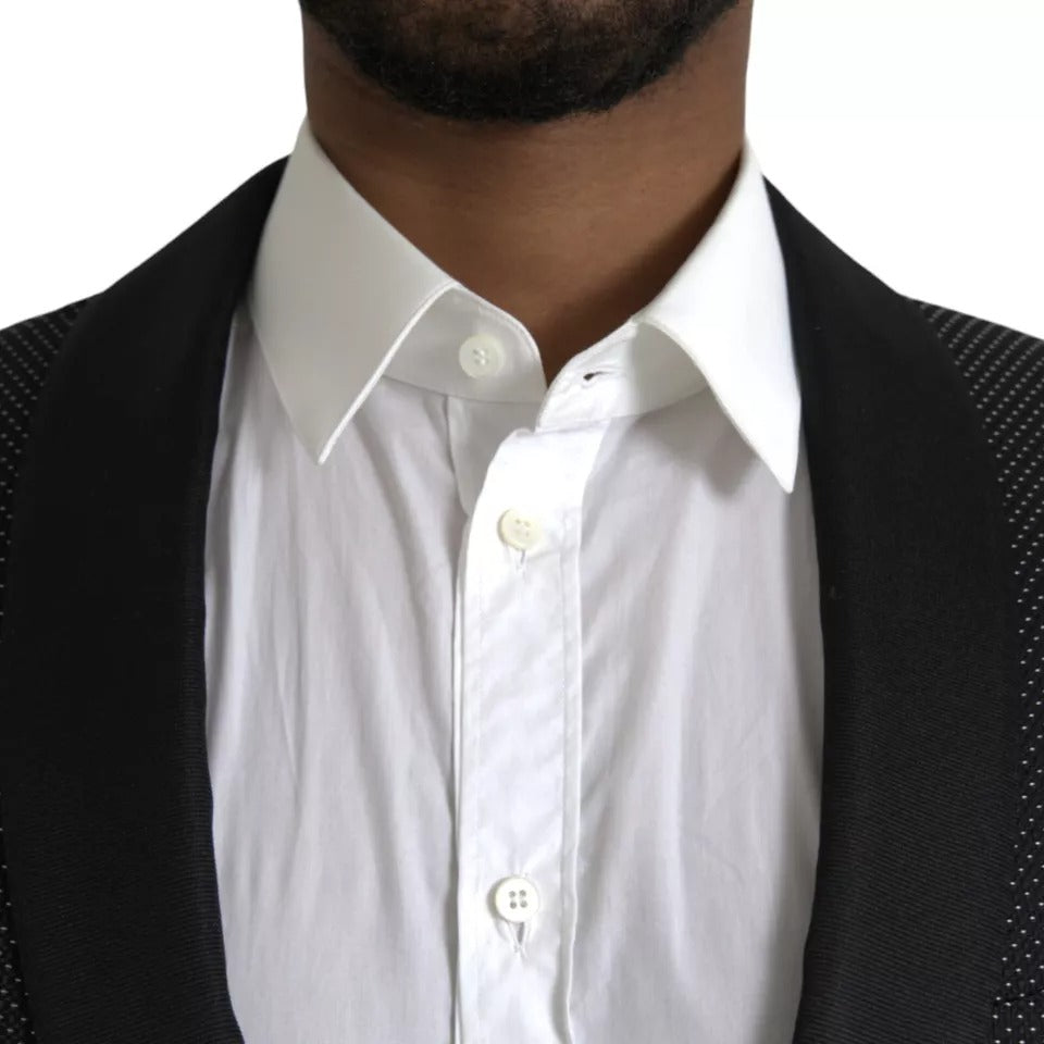 Discover the exquisite Dolce & Gabbana Black Jacquard MARTINI Blazer, a timeless piece crafted in Italy from a luxurious silk blend, embodying elegance and sophistication.