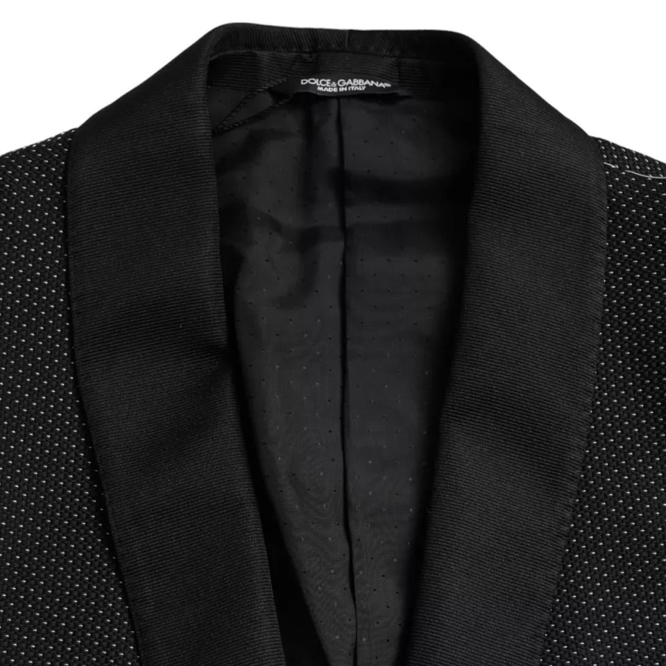 Elevate your wardrobe with the Dolce & Gabbana Black Jacquard MARTINI Blazer, a masterpiece of Italian craftsmanship, blending luxurious silk and timeless elegance for the discerning individual.
