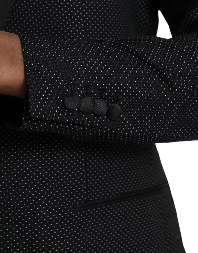 Elevate your wardrobe with the Dolce & Gabbana Black Jacquard MARTINI Blazer, a masterpiece of Italian craftsmanship, blending luxurious silk and timeless elegance for the discerning individual.