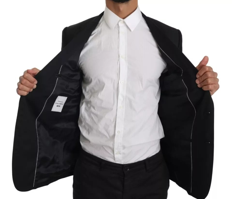 Indulge in the exquisite Dolce & Gabbana Black Slim Jacket Coat Blazer MARTINI, crafted from luxurious virgin wool, embodying timeless elegance and sophisticated allure.