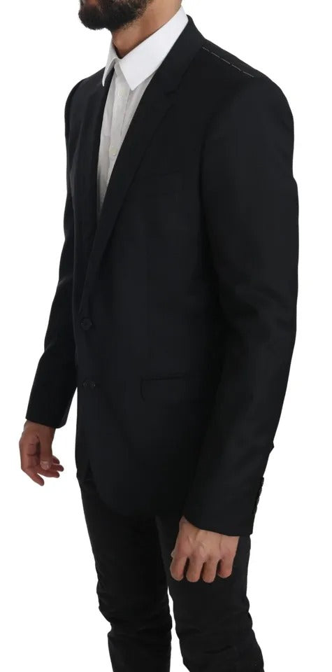 Elevate your wardrobe with the Dolce & Gabbana Black Slim Jacket Coat Blazer MARTINI, a masterpiece of 100% Virgin Wool, embodying timeless sophistication and Italian craftsmanship.