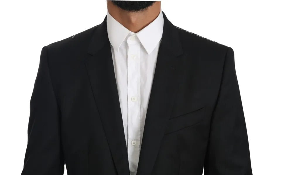 Elevate your wardrobe with the Dolce & Gabbana Black Slim Jacket Coat Blazer MARTINI, crafted from luxurious virgin wool, embodying exquisite Italian couture and timeless elegance.