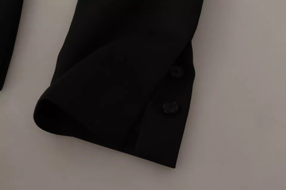 Discover the exquisite Dolce & Gabbana Black Polyester Single Breasted Blazer, a timeless blend of luxury and elegance, crafted in Italy for the discerning individual.