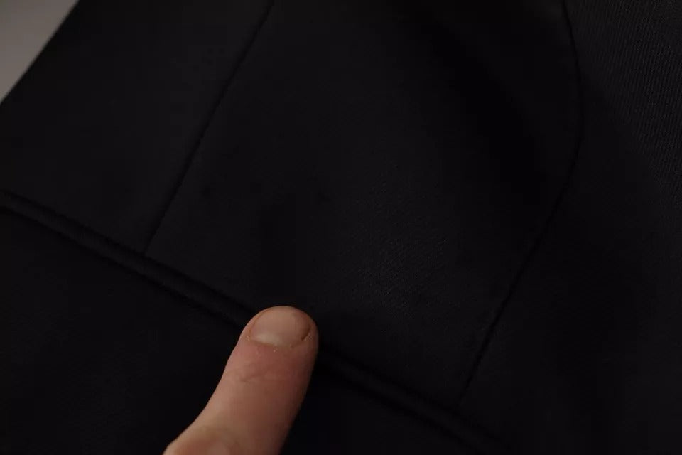 Experience the exquisite elegance of Dolce & Gabbana's Black Polyester Single Breasted Blazer, a timeless piece crafted in Italy, embodying luxury and sophistication.