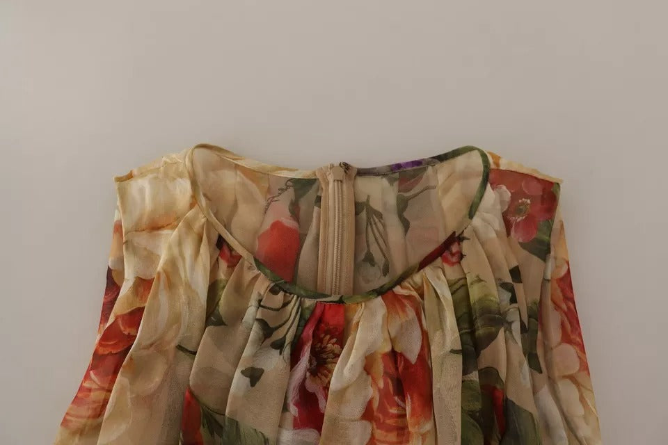 Indulge in the exquisite allure of the Dolce & Gabbana Beige Floral Silk Mini Dress, a masterpiece of Italian craftsmanship that elevates your elegance for any occasion.