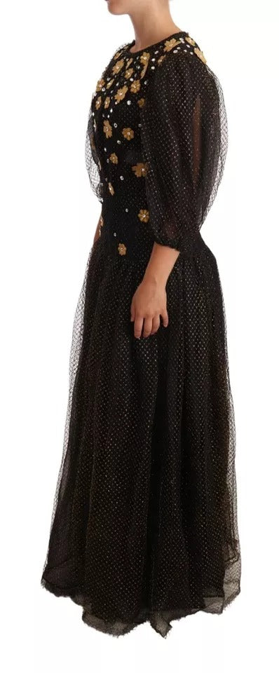 Experience the allure of the Dolce & Gabbana Black Crystal Floral Maxi Ball Gown, where luxurious silk and exquisite crystal embellishments redefine elegance for unforgettable evenings.