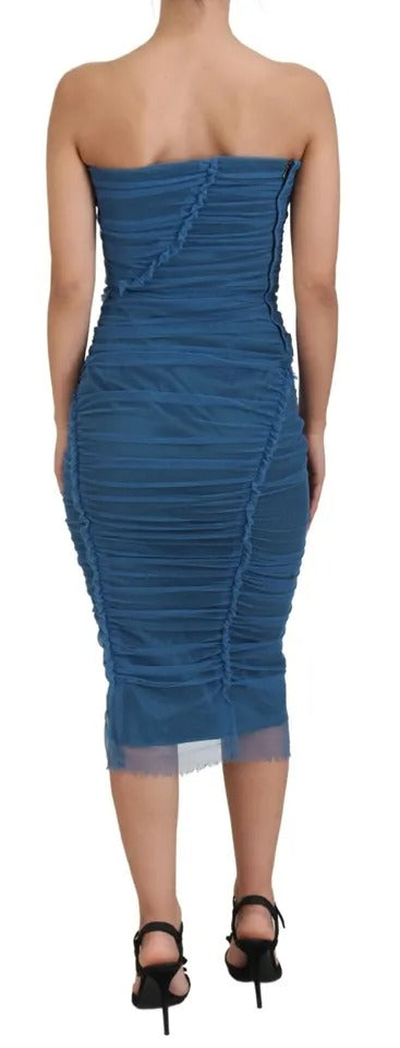 Experience the allure of the Dolce & Gabbana Blue Mesh Trim Ruched Tulle Sheath Dress, a masterpiece of Italian craftsmanship that embodies timeless elegance and sophistication.