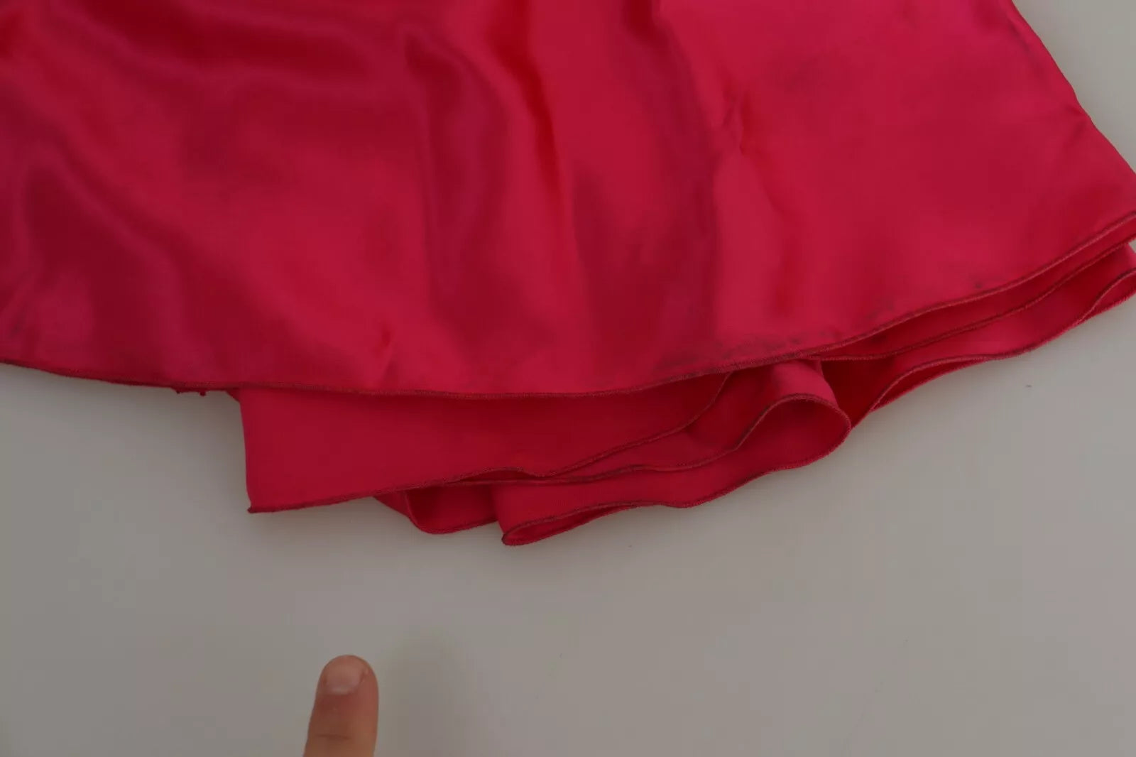Indulge in the exquisite allure of the Dolce & Gabbana Fuchsia Fitted Cut One Shoulder Midi Dress, a timeless silk masterpiece that embodies luxury and sophistication.