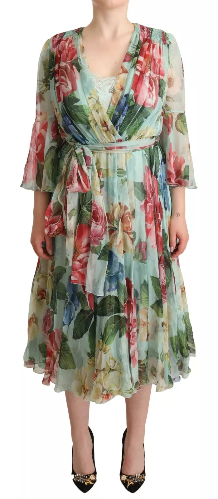 Experience the allure of the Dolce & Gabbana Green Floral Long Sleeve V-neck Midi Dress, crafted from luxurious silk, embodying exquisite Italian craftsmanship for timeless elegance.