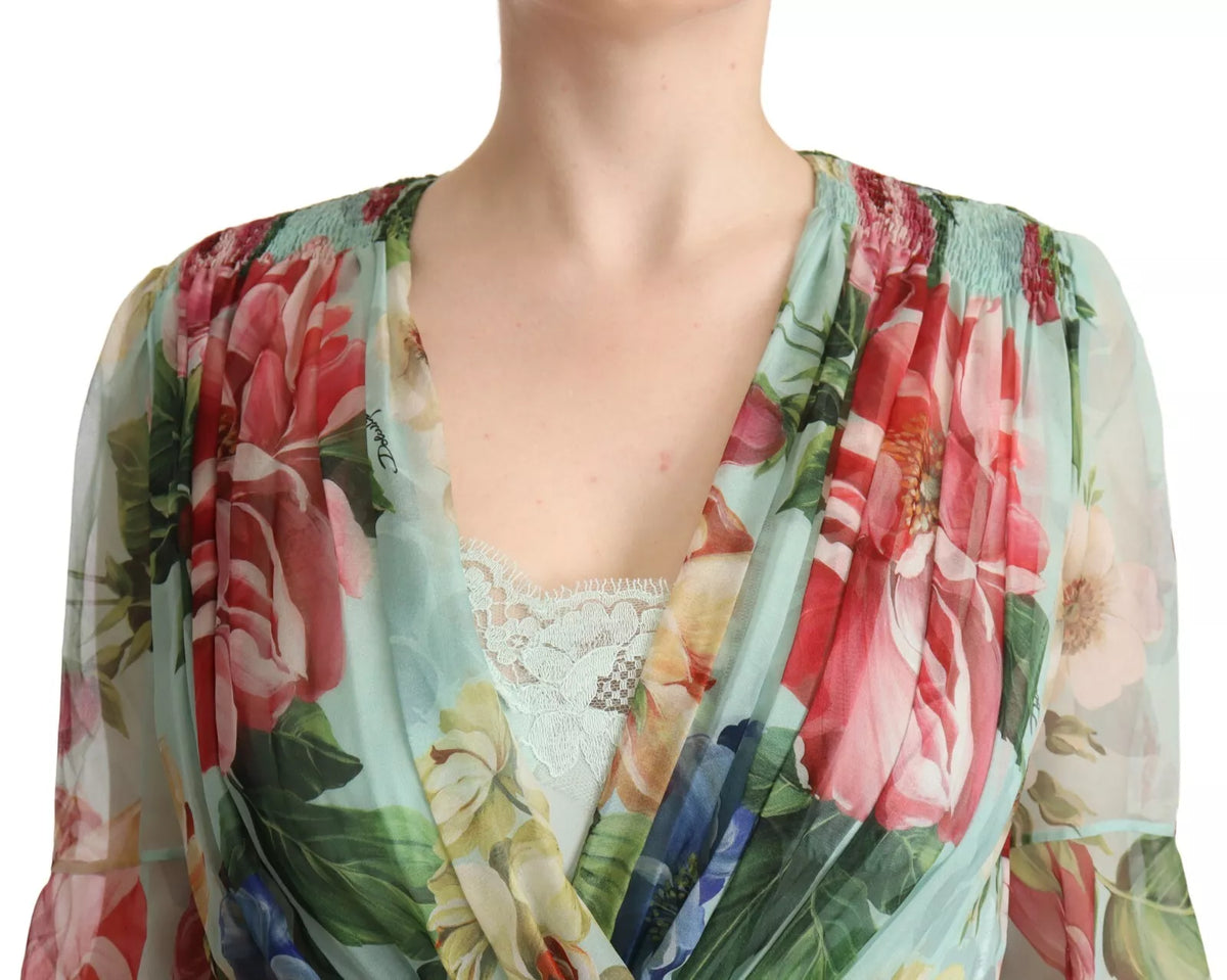 Experience the allure of Dolce & Gabbana's Green Floral Long Sleeve V-neck Midi Dress, a silk masterpiece that embodies exquisite craftsmanship and timeless elegance.
