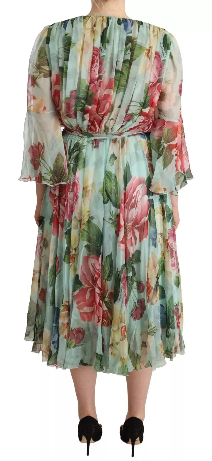 Indulge in the exquisite allure of the Dolce & Gabbana Green Floral Long Sleeve V-neck Midi Dress, a silk masterpiece that embodies luxury and timeless elegance for unforgettable moments.