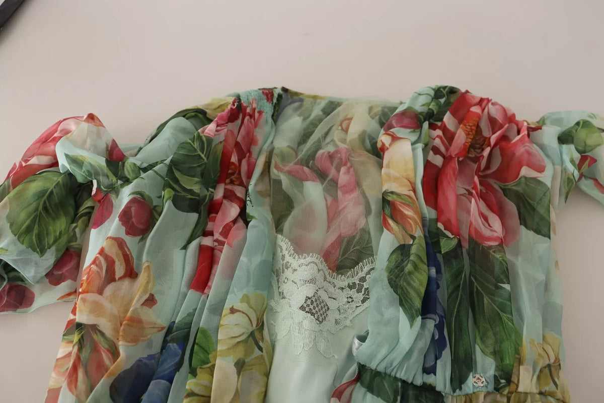 Indulge in the exquisite allure of the Dolce & Gabbana Green Floral Long Sleeve V-neck Midi Dress, crafted from luxurious silk, embodying timeless elegance and refined sophistication.